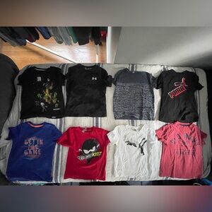 Bundle of 8 boys size XS short sleeve T-shirts.